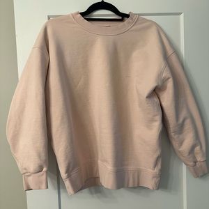 LuluLemon pale blush pink sweat shirt fits small-medium